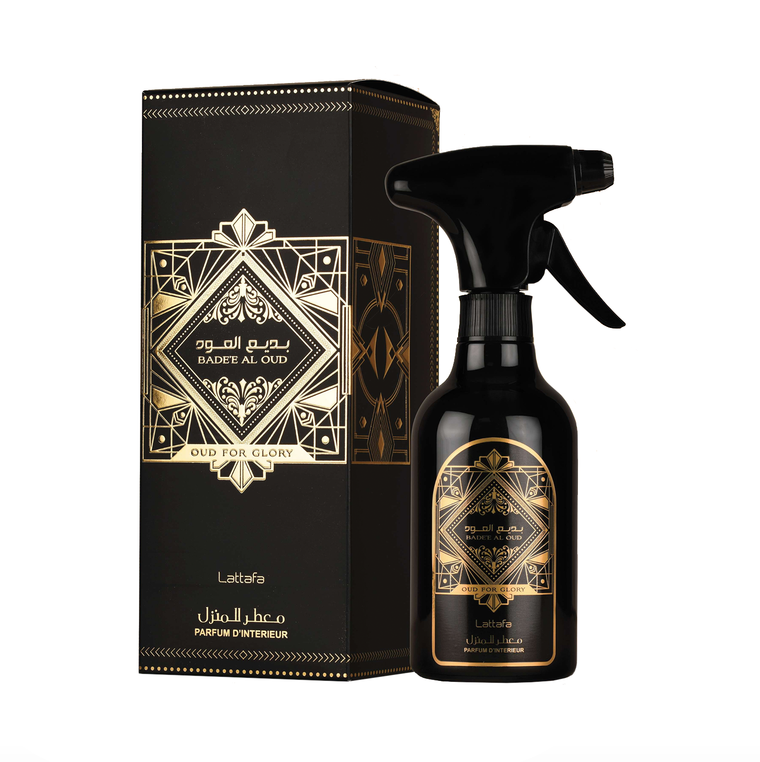 A professional product photograph of the Lattafa Badee Al Oud 450ml room spray bottle presented next to its original elegant packaging, highlighting the premium, sophisticated design of the fragrance collection.