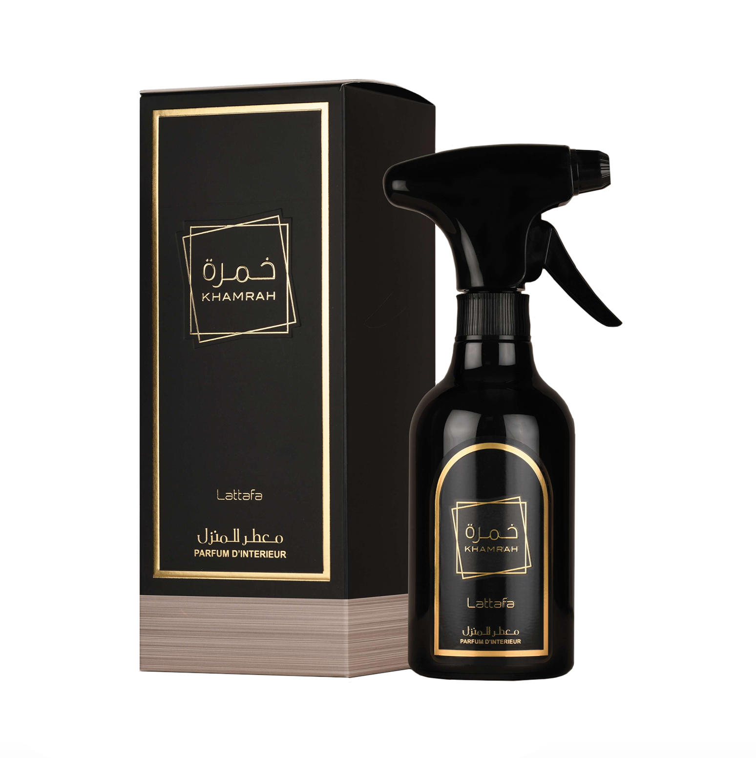 A professional product photograph of the Lattafa Khamrah 450ml room spray bottle displayed next to its elegant packaging, highlighting the premium, sophisticated aesthetic of this luxury home fragrance.