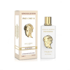 A professional product presentation showing the elegant white 100ml bottle of Phenomena positioned next to its matching gift box, which features a detailed gold-toned sculptural face.